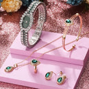 Conjunto Feminino de Luxo Pretty Lovely – Colar, Anel Ajustável, Pulseira, Brincos e Relógio em Aço Inoxidável com Zircônias Verdes – Acompanha Bolsa de Veludo